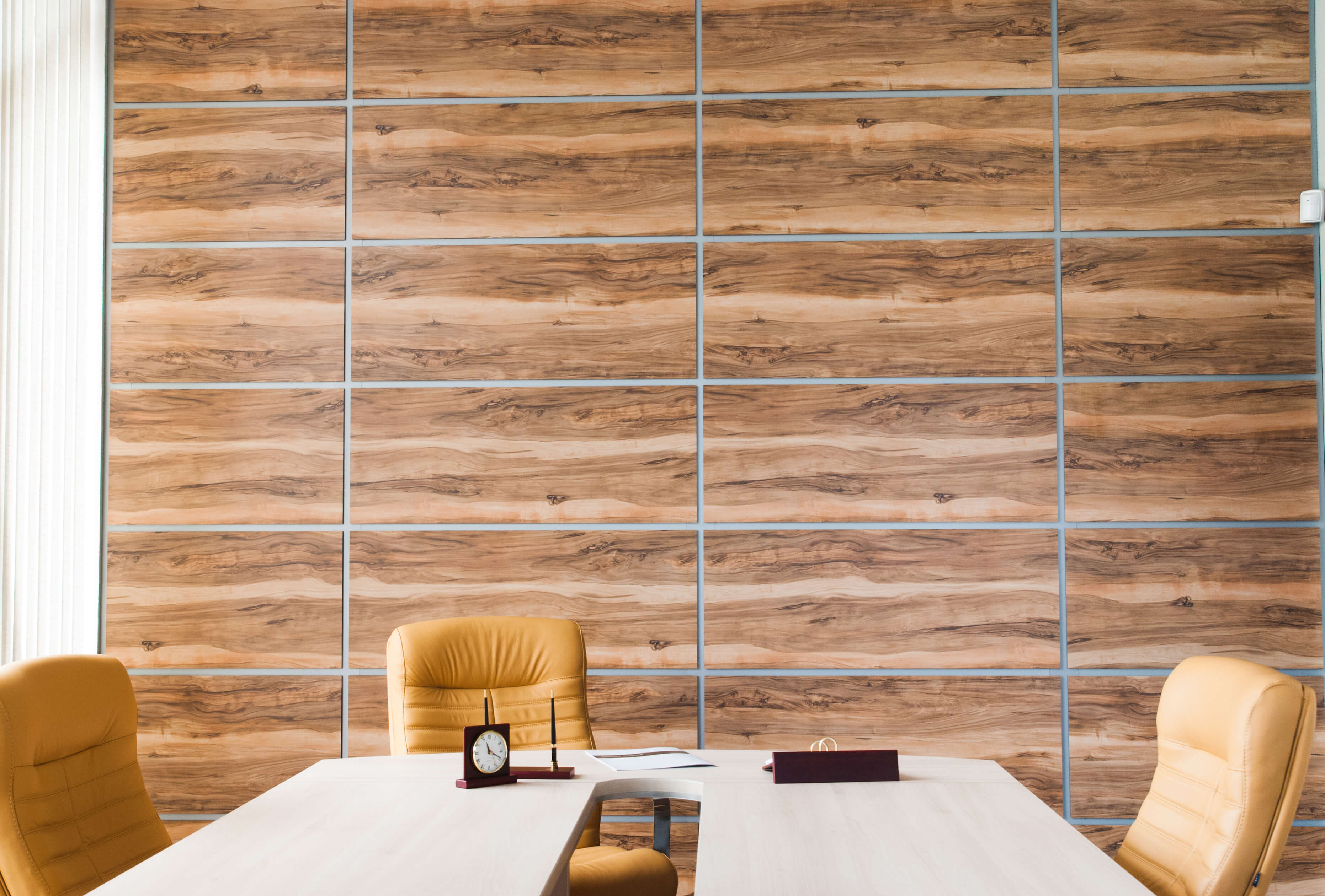 Modern office interior design with wall of synthetic wood panels